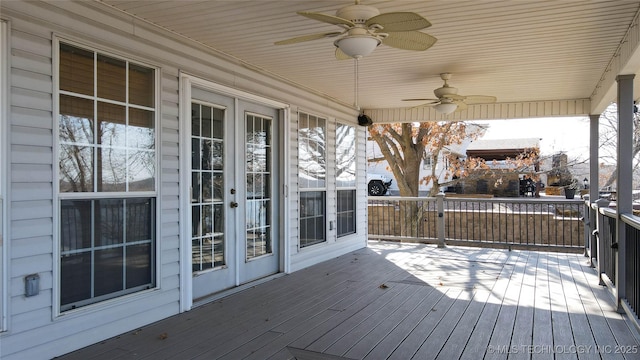 snow covered deck featuring ceiling fan