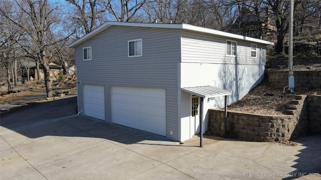 view of home's exterior with a garage