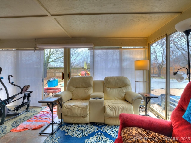 sunroom featuring a wealth of natural light