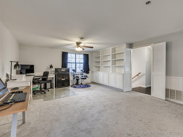 office area featuring carpet and a ceiling fan