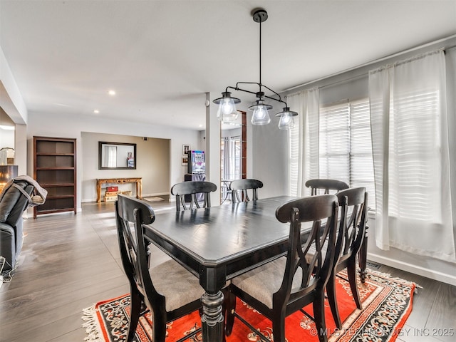 dining area with hardwood / wood-style flooring