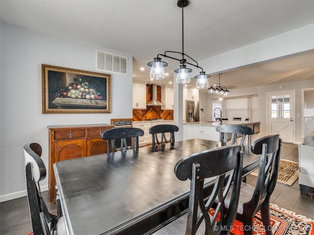 dining area featuring sink