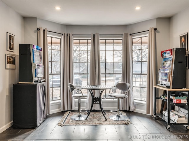 dining area with recessed lighting and baseboards