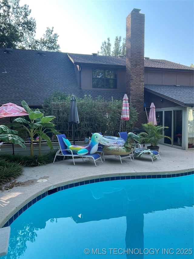 pool featuring a patio