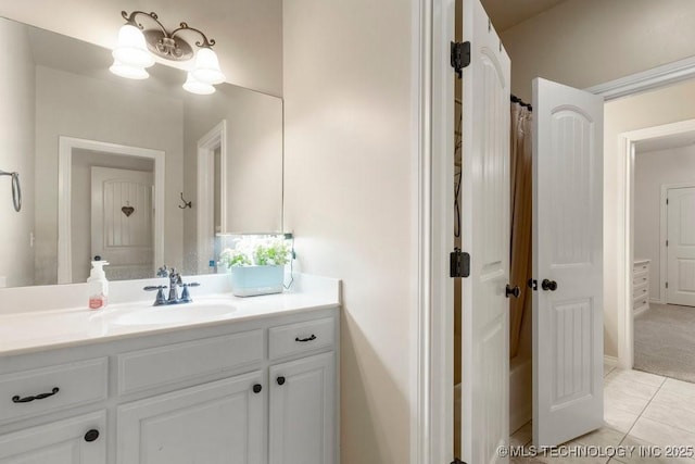 bathroom featuring tile patterned floors and vanity