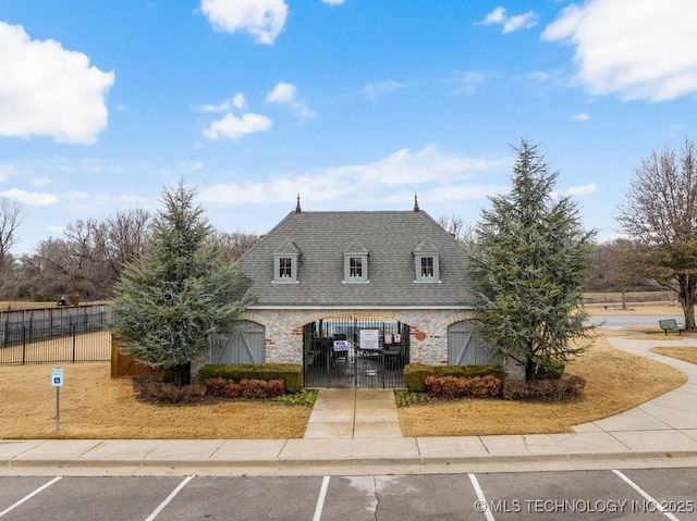 view of new england style home