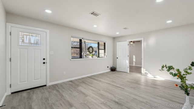 foyer entrance featuring light hardwood / wood-style flooring