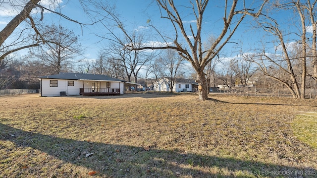 view of yard featuring a wooden deck