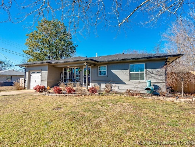 view of front of property with a garage, a porch, and a front yard