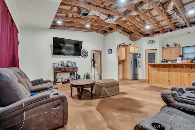 living room featuring concrete flooring