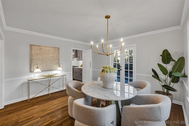 dining area featuring ornamental molding, french doors, dark wood-type flooring, and baseboards