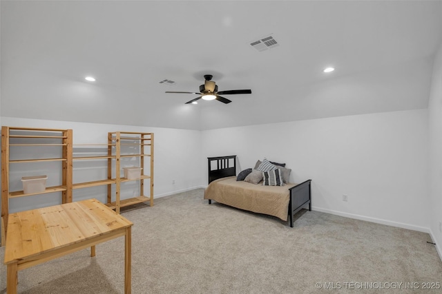 bedroom with vaulted ceiling, carpet, and ceiling fan