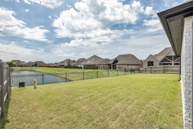 view of yard with a water view