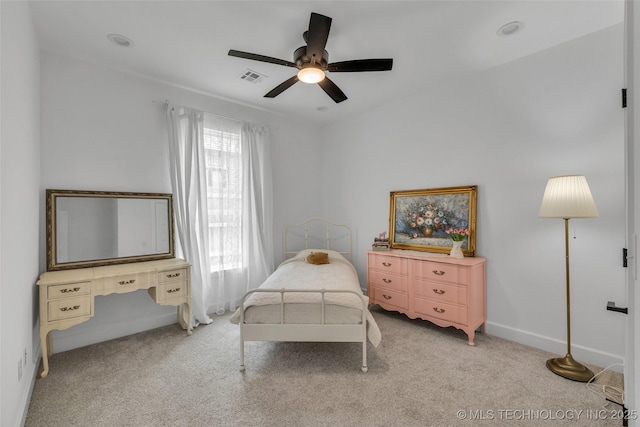 bedroom featuring ceiling fan and light colored carpet