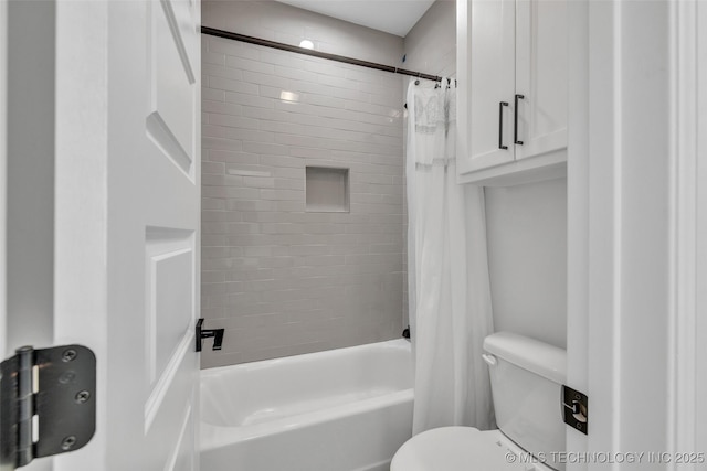 bathroom with shower / bath combination with curtain and toilet