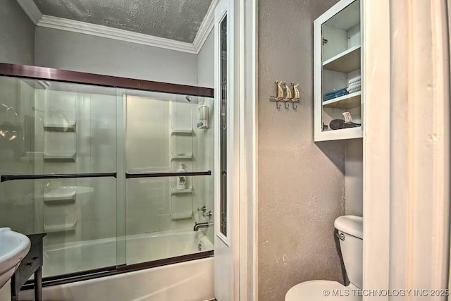 bathroom with ornamental molding, combined bath / shower with glass door, a textured ceiling, and toilet