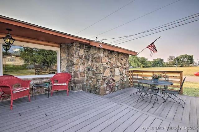 view of deck at dusk