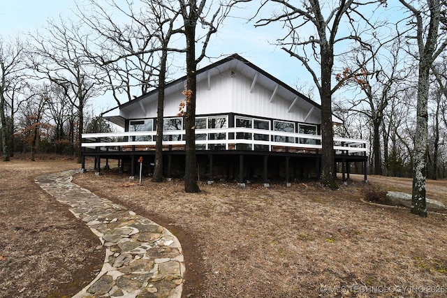 view of front of property featuring a wooden deck