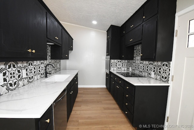 kitchen with dishwasher, sink, black electric stovetop, light hardwood / wood-style floors, and a textured ceiling