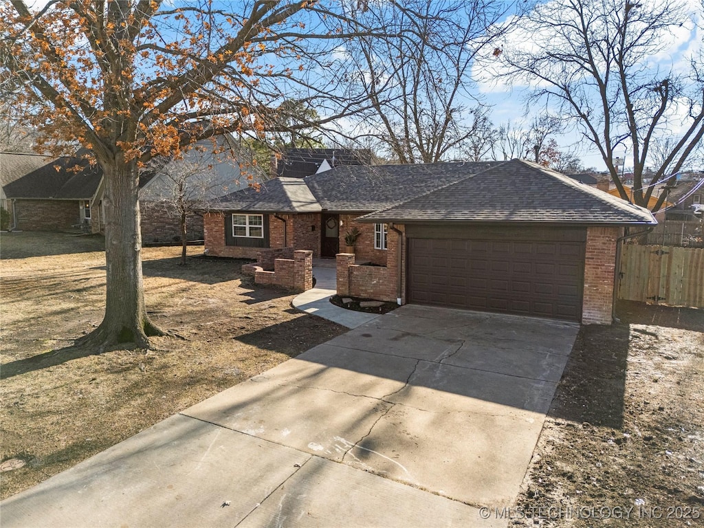 single story home featuring a garage