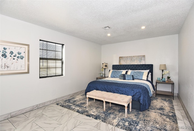 bedroom with a textured ceiling