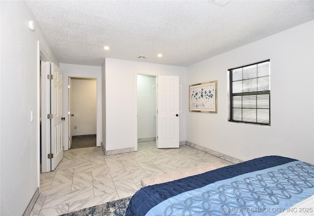 bedroom with a textured ceiling