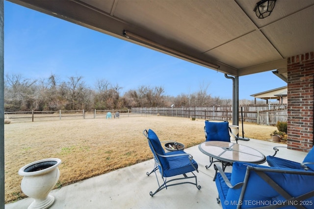 view of patio with a rural view