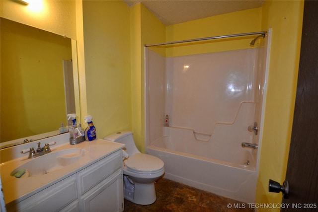 full bathroom featuring bathing tub / shower combination, vanity, and toilet