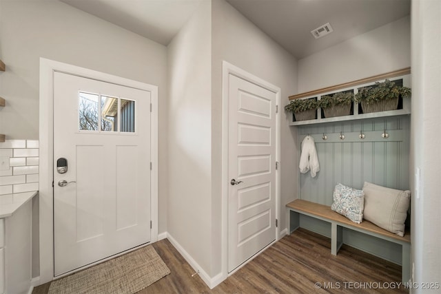 mudroom with dark wood-type flooring