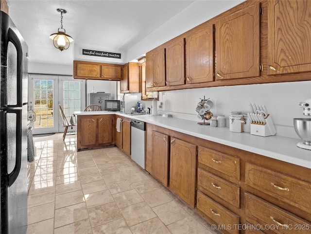 kitchen featuring sink and black appliances