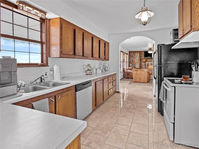 kitchen featuring dishwasher, sink, hanging light fixtures, white electric range oven, and ceiling fan