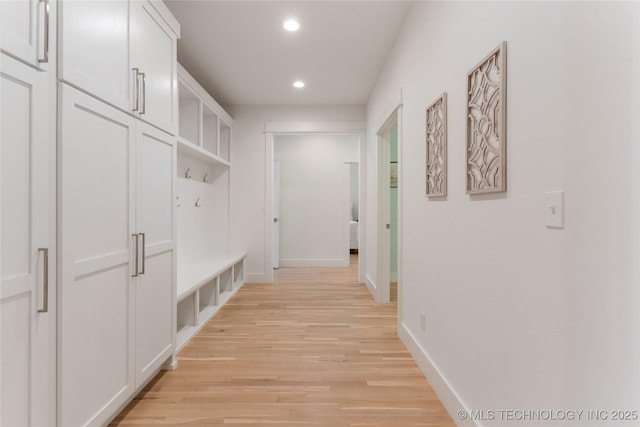 mudroom with light wood-type flooring