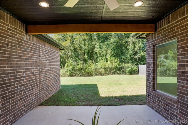 view of yard featuring ceiling fan