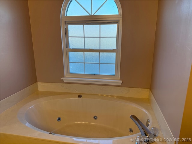 bathroom featuring a tub