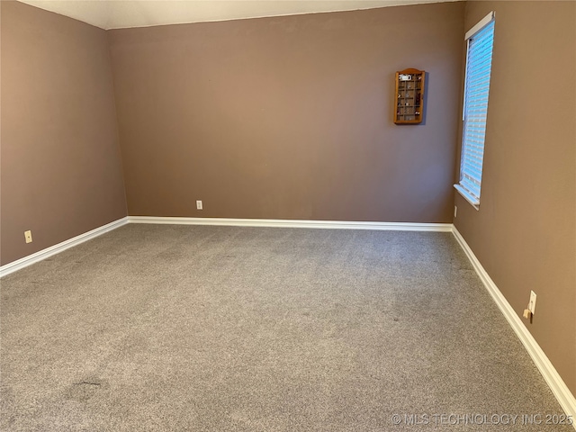 unfurnished room featuring carpet floors