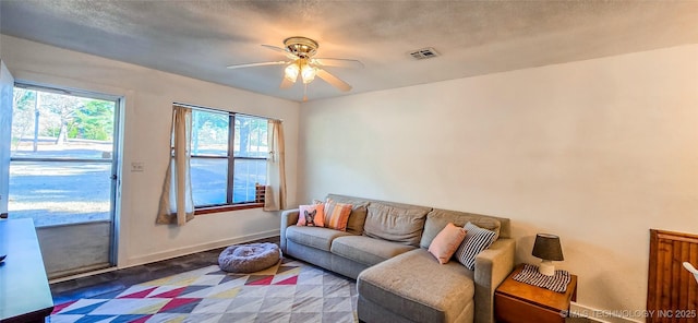 living room featuring ceiling fan