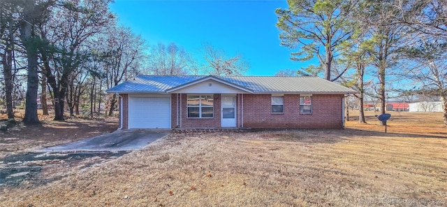 ranch-style home with a garage and a front lawn