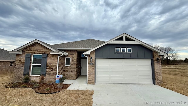 view of front of property with a garage