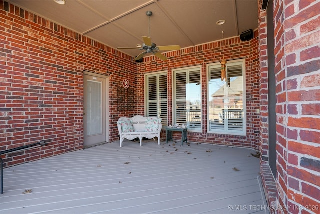 wooden terrace with ceiling fan