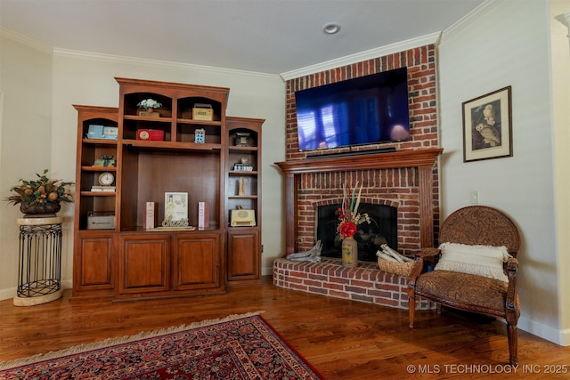 living room featuring a brick fireplace, hardwood / wood-style flooring, and ornamental molding