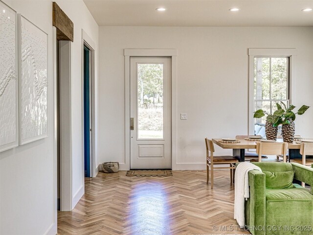 interior space with light parquet floors