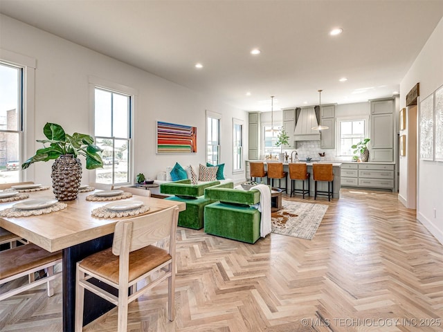 dining area with light parquet floors