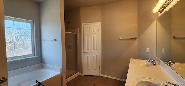 bathroom with tile patterned floors, separate shower and tub, and vanity