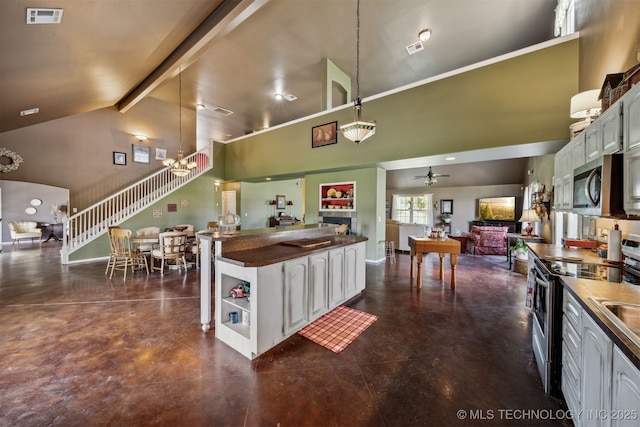 kitchen with ceiling fan with notable chandelier, high vaulted ceiling, white cabinets, stainless steel appliances, and beam ceiling