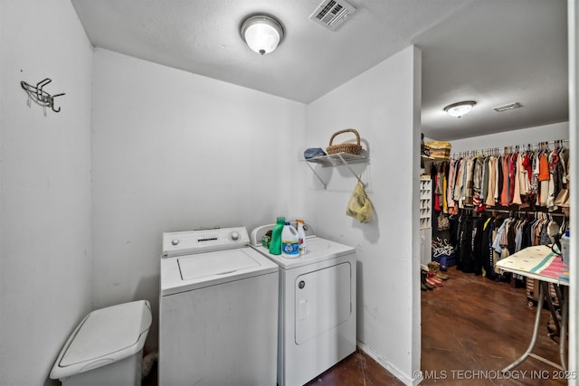 washroom with separate washer and dryer