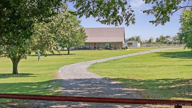 surrounding community featuring a lawn