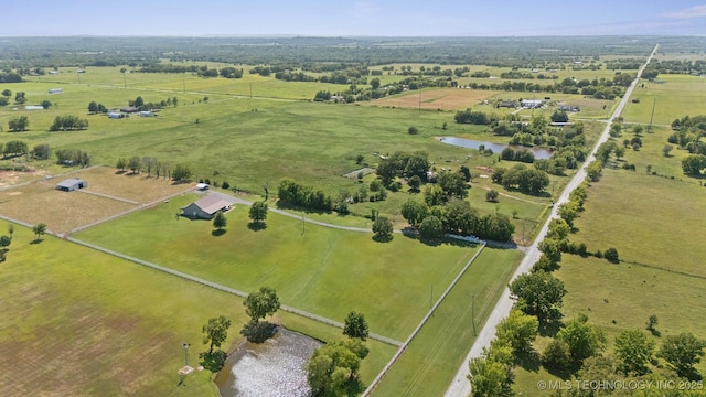 bird's eye view featuring a water view and a rural view