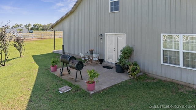 exterior space featuring a yard and a patio area