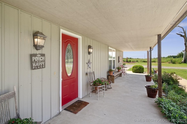 entrance to property with a porch