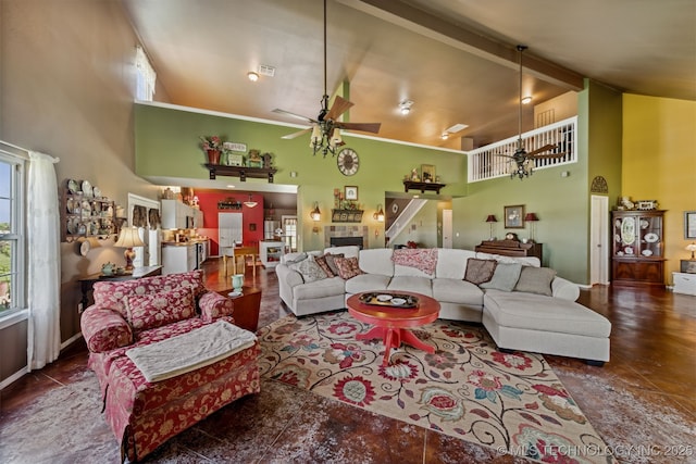 living room featuring high vaulted ceiling and ceiling fan